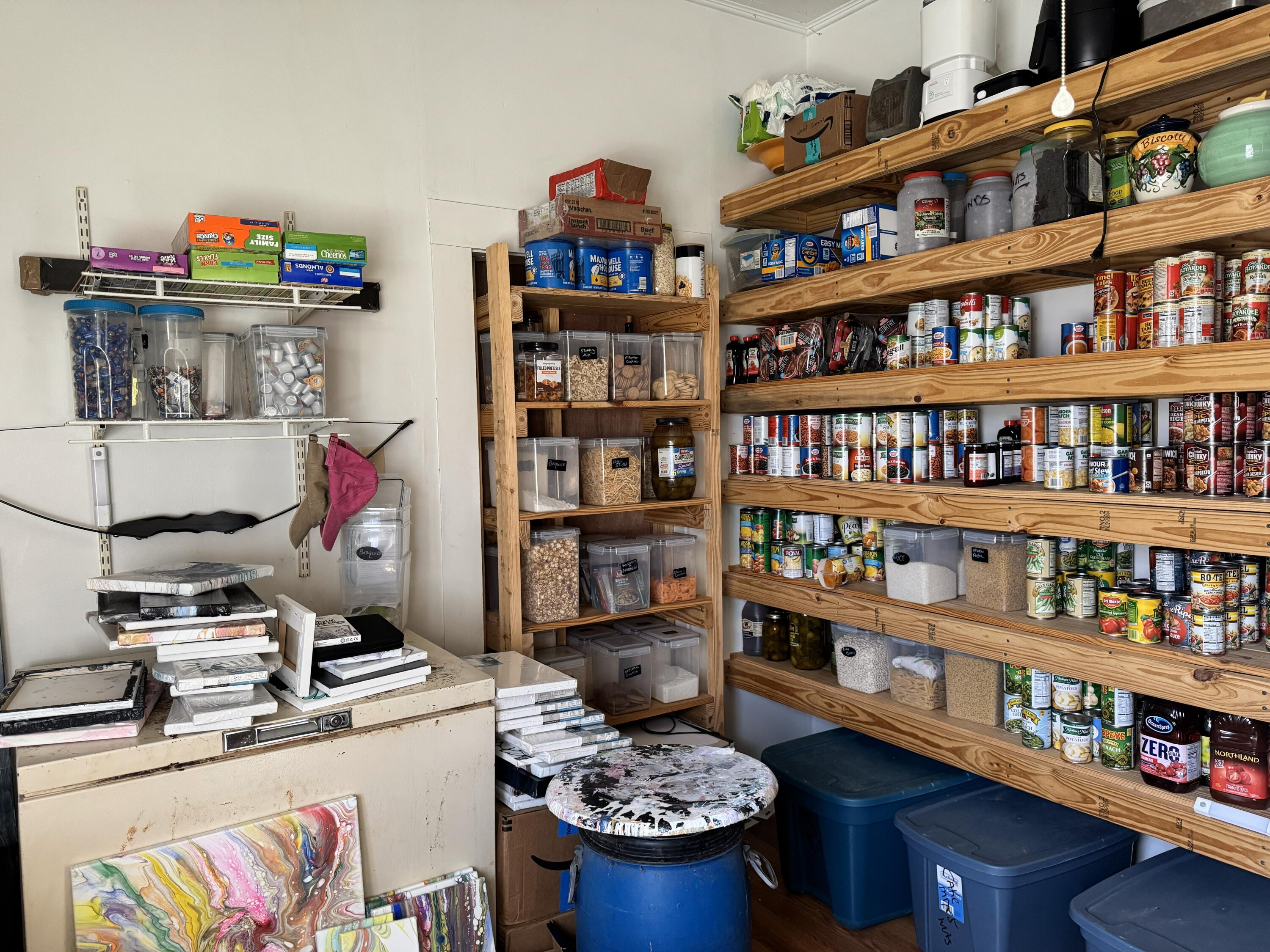 2864 Sixth Street Florala, AL 36442 - Photo 16 of 28 a room with furniture a book shelf and a shelf