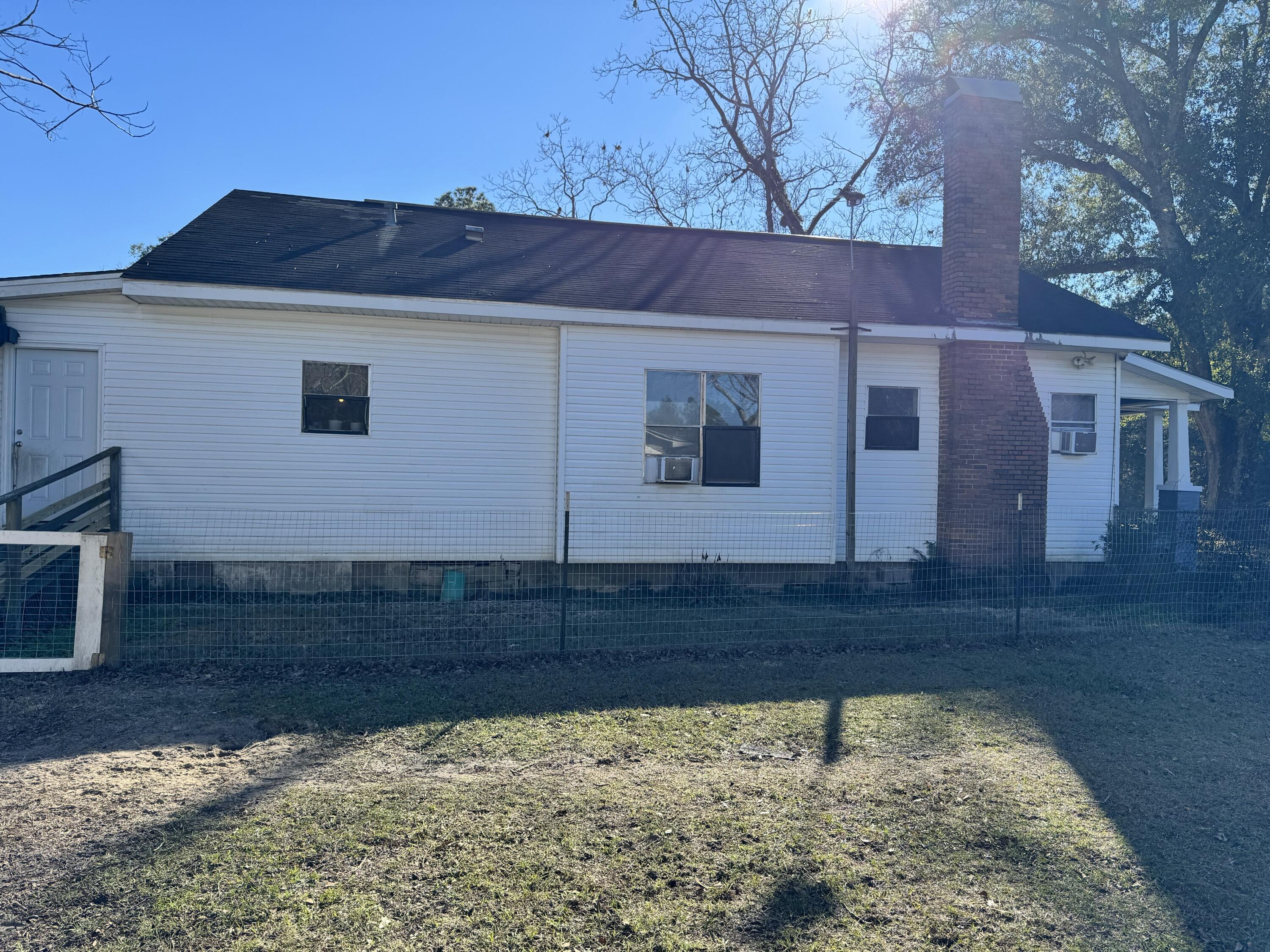 2864 Sixth Street Florala, AL 36442 - Photo 17 of 28 a view of a house with a yard