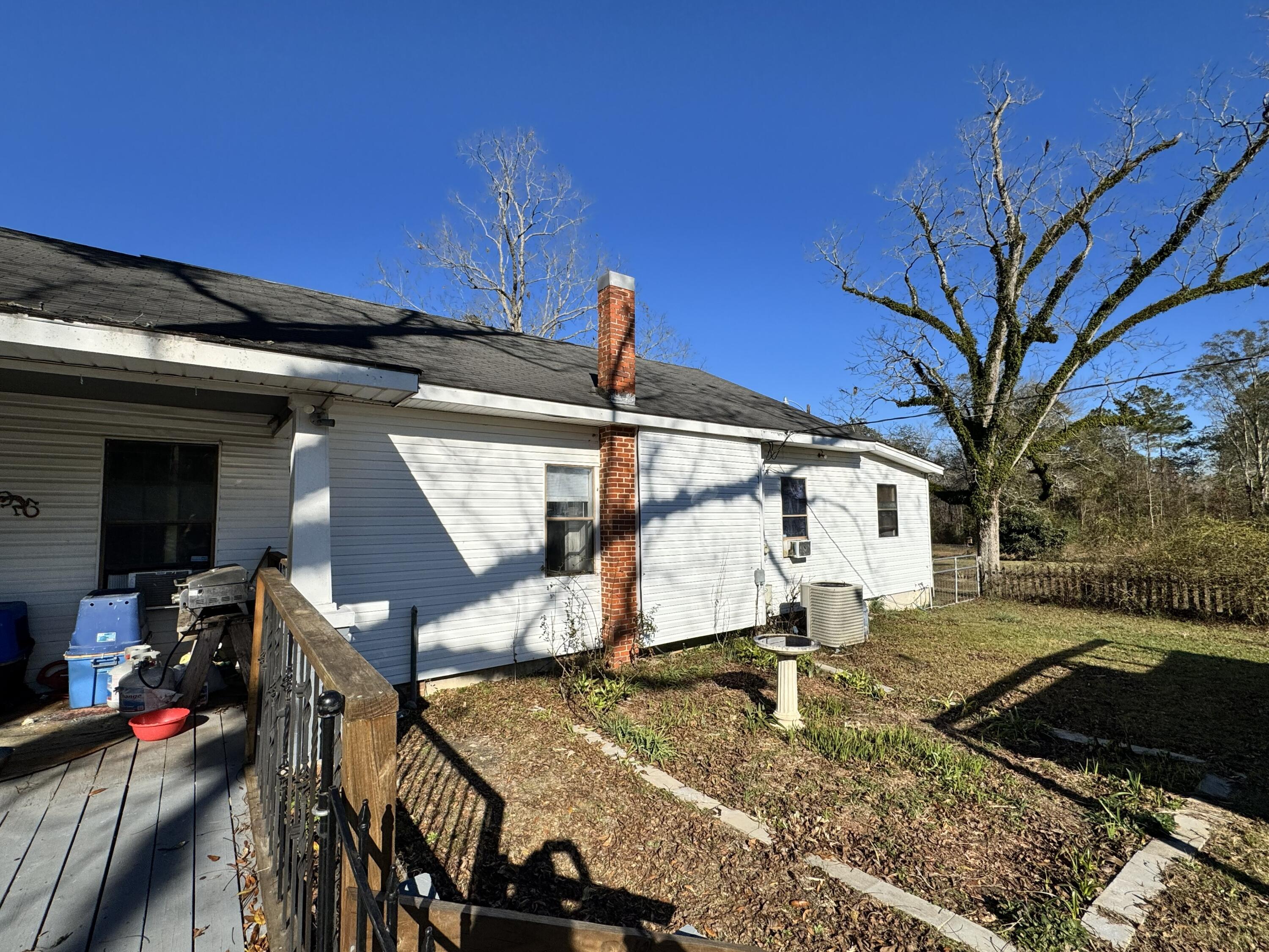2864 Sixth Street Florala, AL 36442 - Photo 18 of 28 a view of a backyard with sitting area