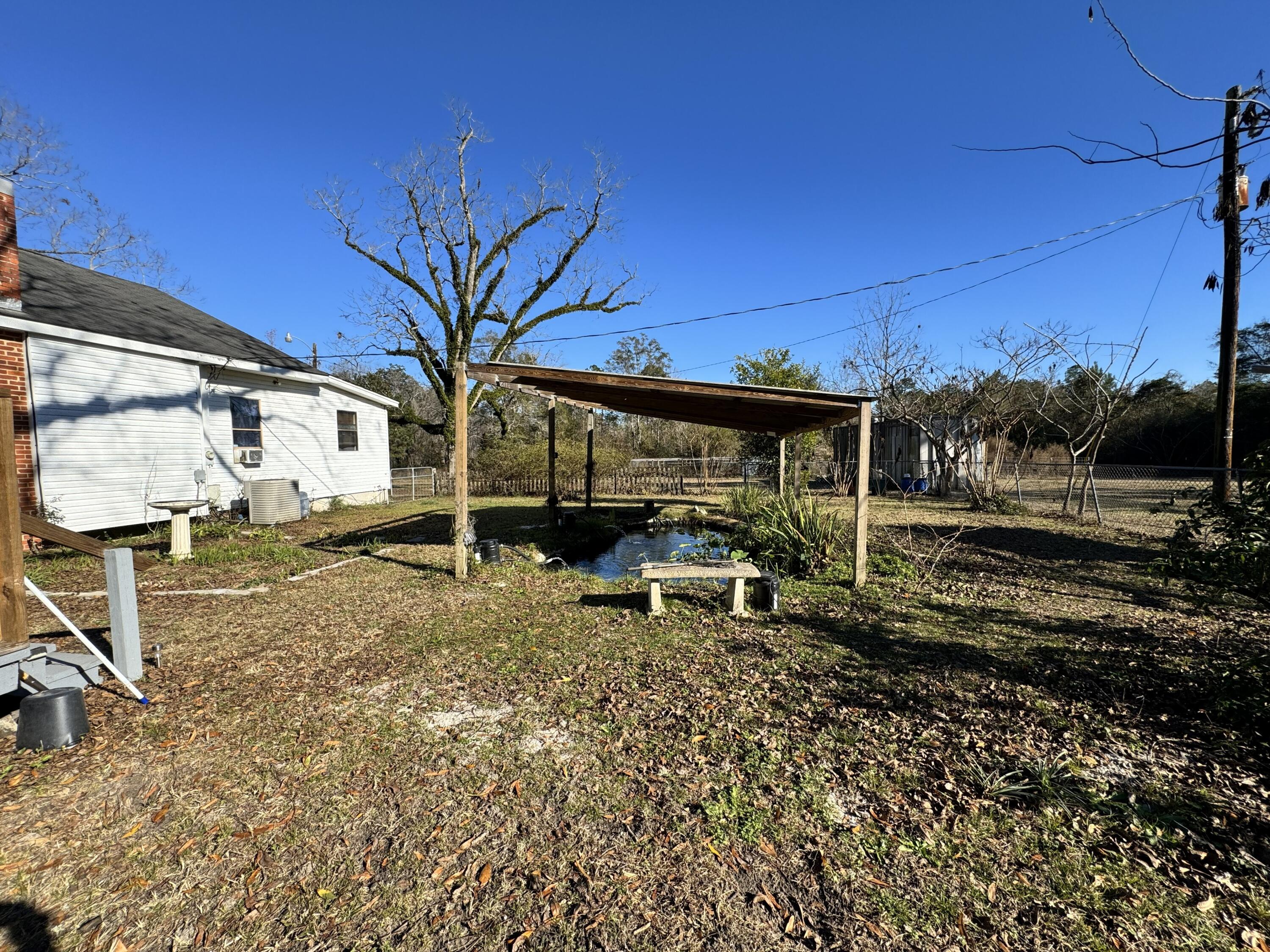 2864 Sixth Street Florala, AL 36442 - Photo 19 of 28 a view of a house with backyard