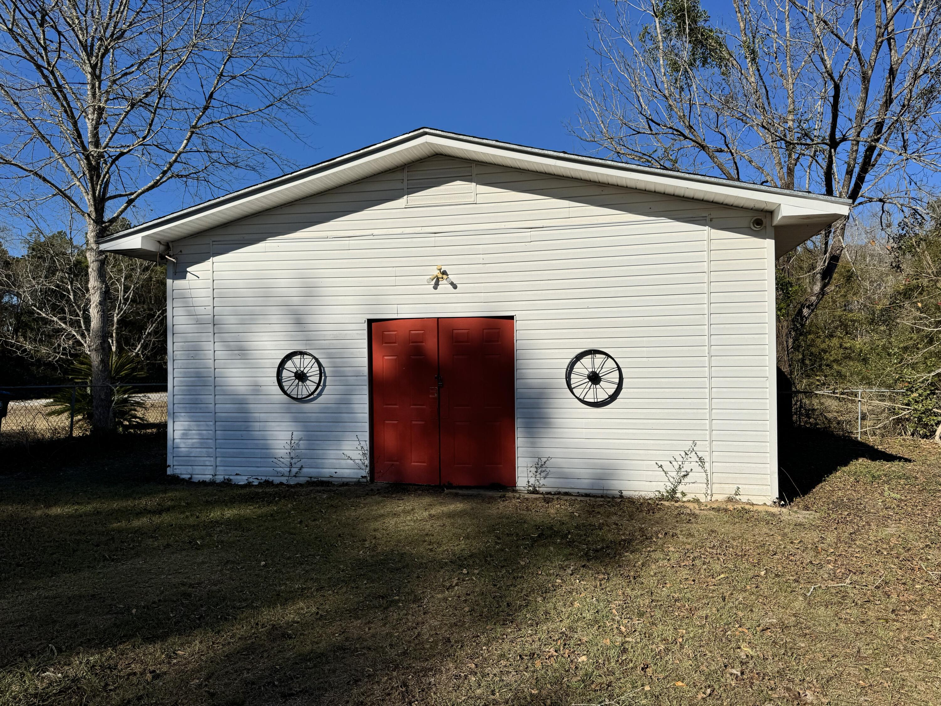 2864 Sixth Street Florala, AL 36442 - Photo 20 of 28 a front view of house with a garden