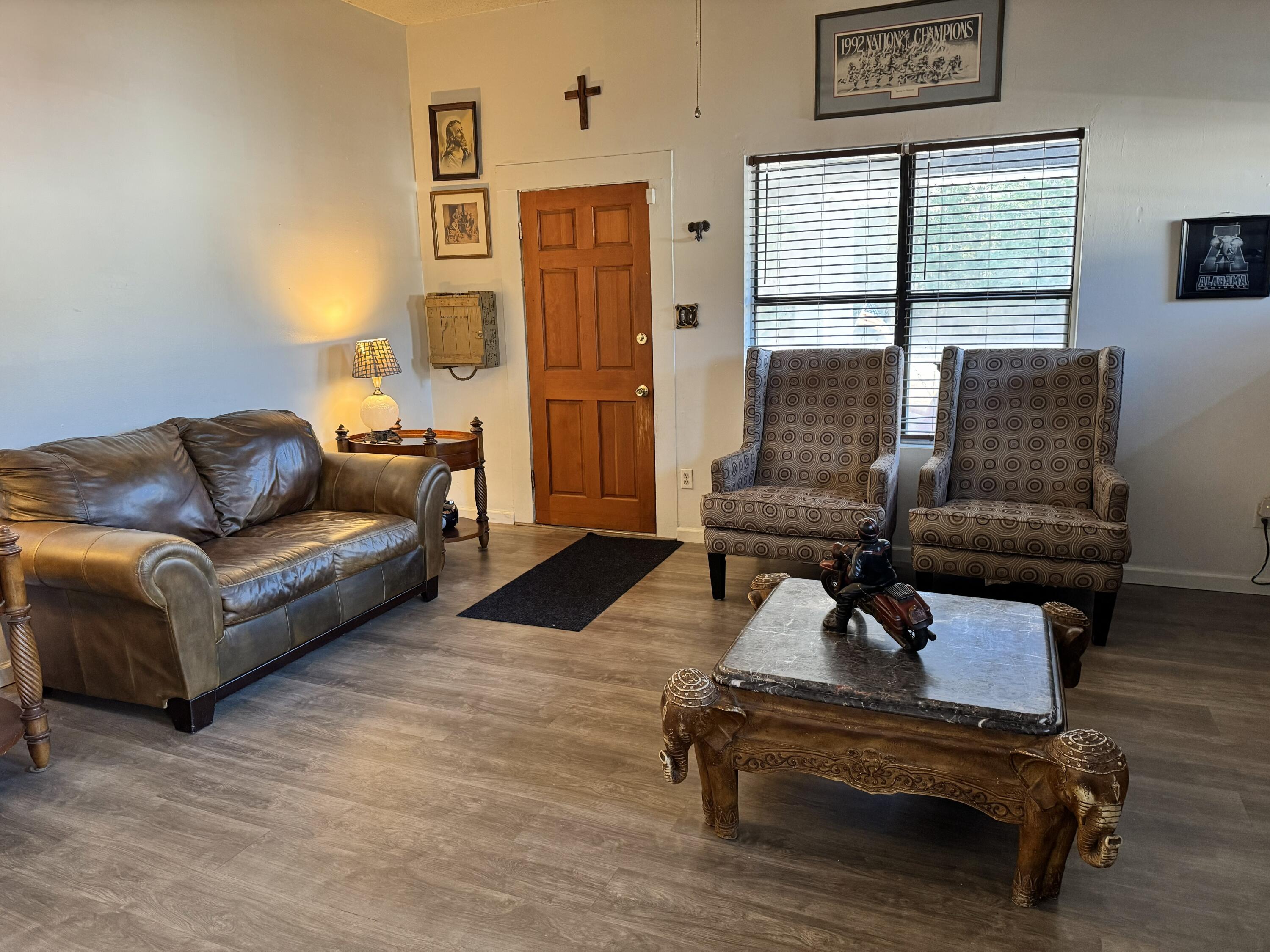 2864 Sixth Street Florala, AL 36442 - Photo 2 of 28 a living room with furniture and wooden floor