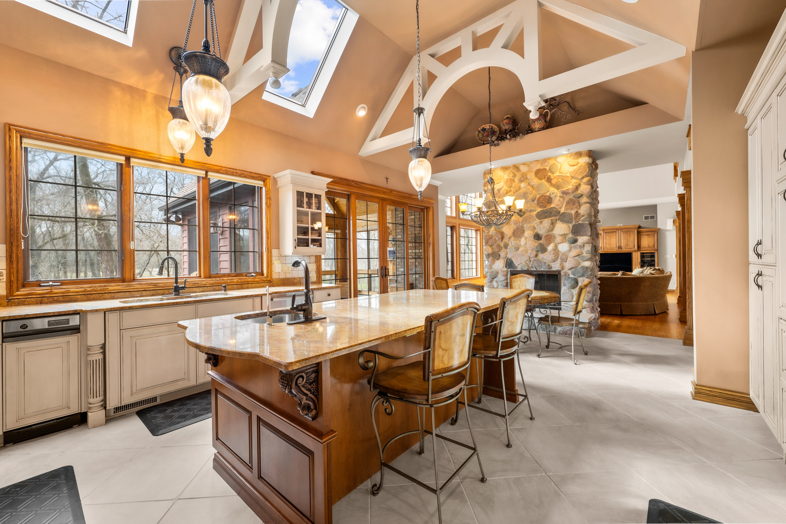 4965 Cemetery Road Morris, IL 60450 - Photo 31 of 82 a dining hall with stainless steel appliances kitchen island granite countertop a stove and large cabinets