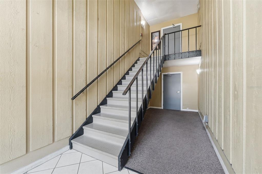 1695 Lee Road, Unit B204 Winter Park, FL 32789 - Photo 2 of 21 a view of entryway and hall with wooden floor