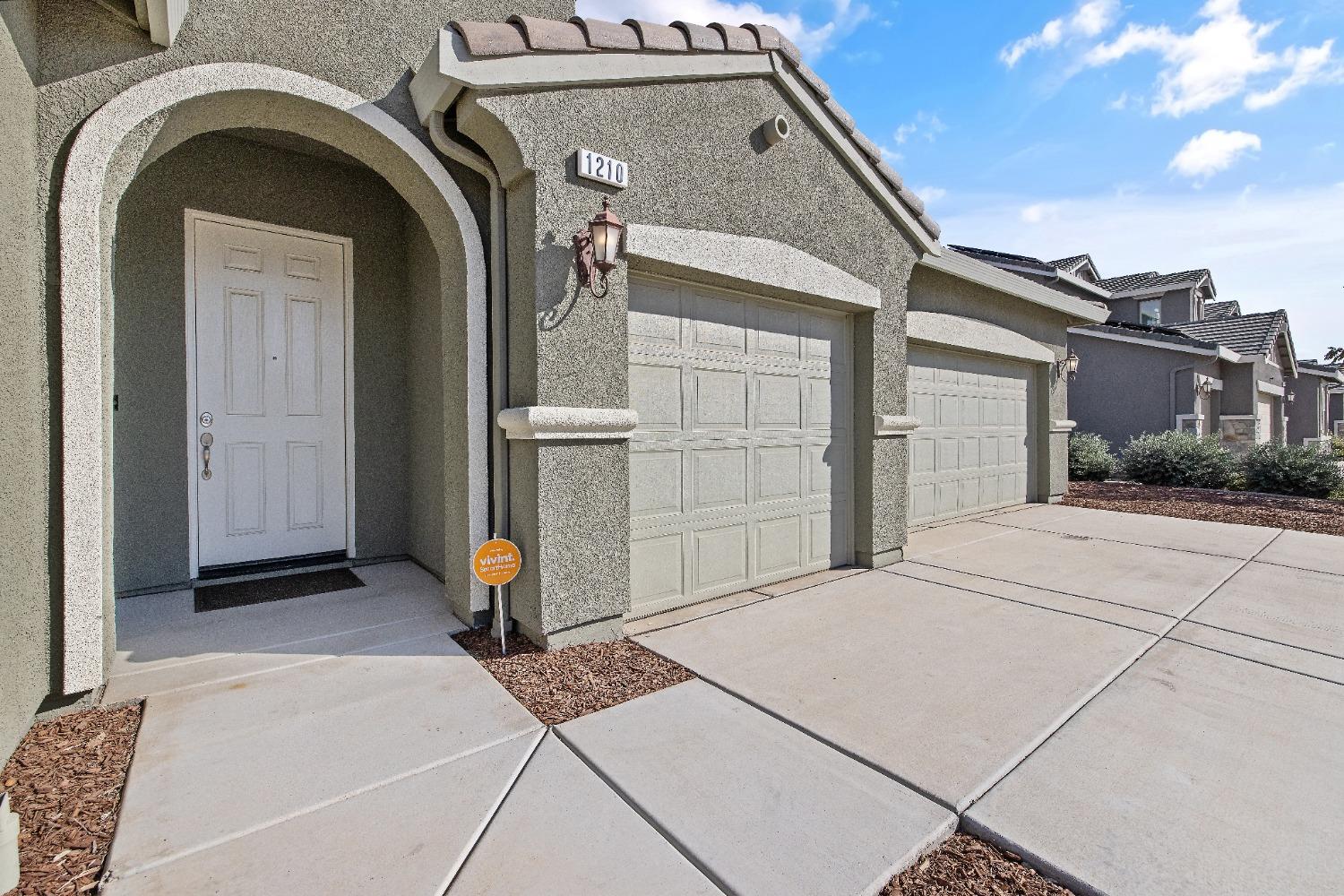1210 Ridge Creek Estates Way Dinuba, CA 93618 - Photo 4 of 50 a view of front door
