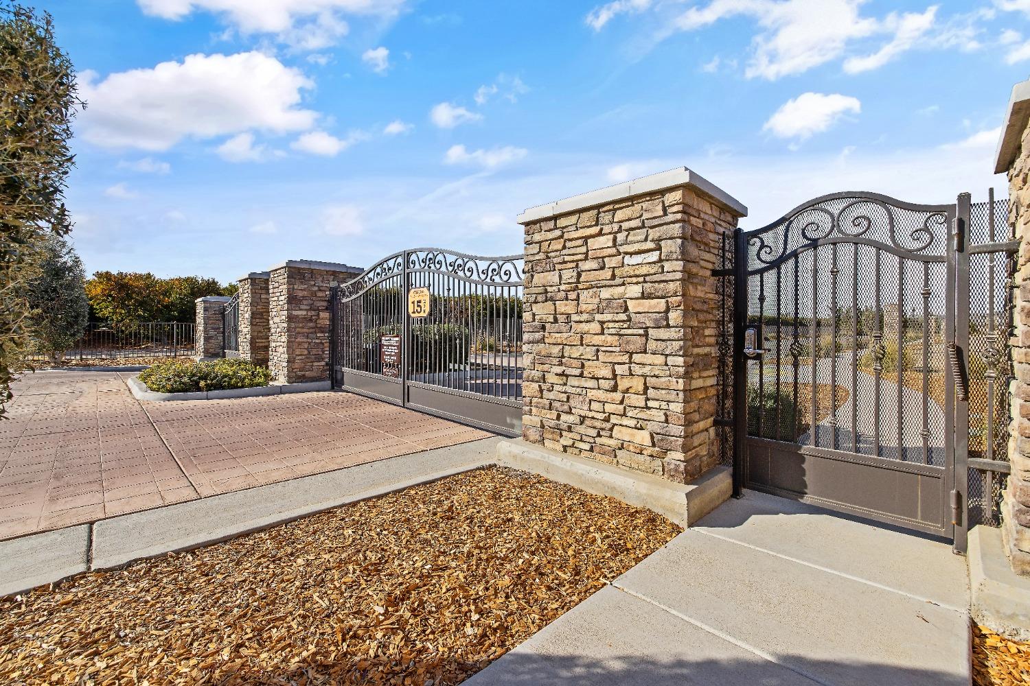 1210 Ridge Creek Estates Way Dinuba, CA 93618 - Photo 49 of 50 a view of a city with tall buildings