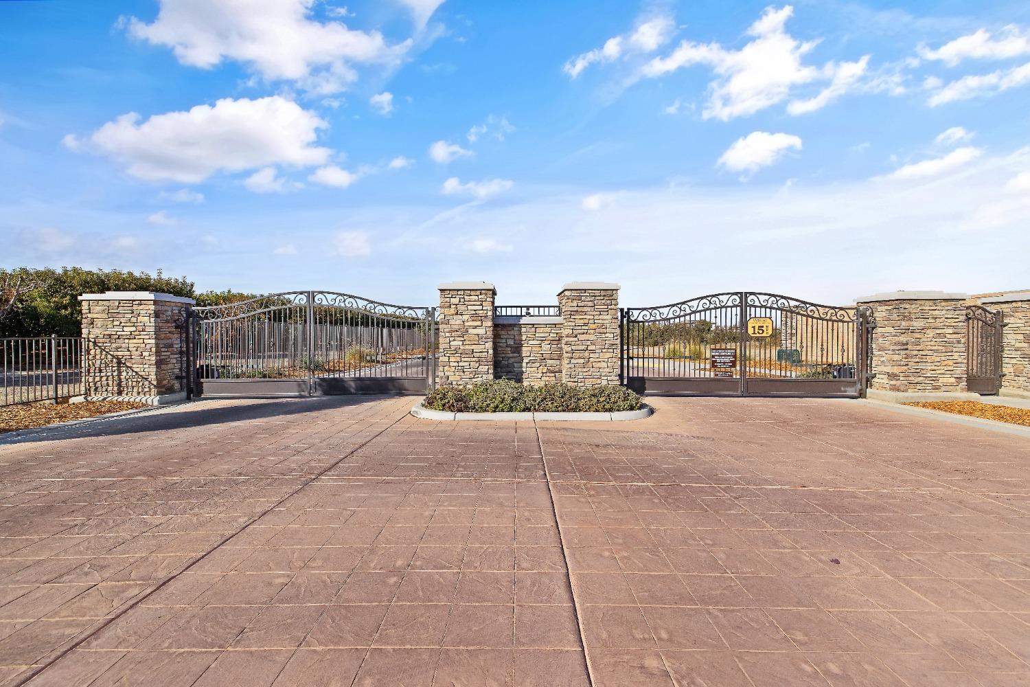 1210 Ridge Creek Estates Way Dinuba, CA 93618 - Photo 50 of 50 a city view with tall buildings