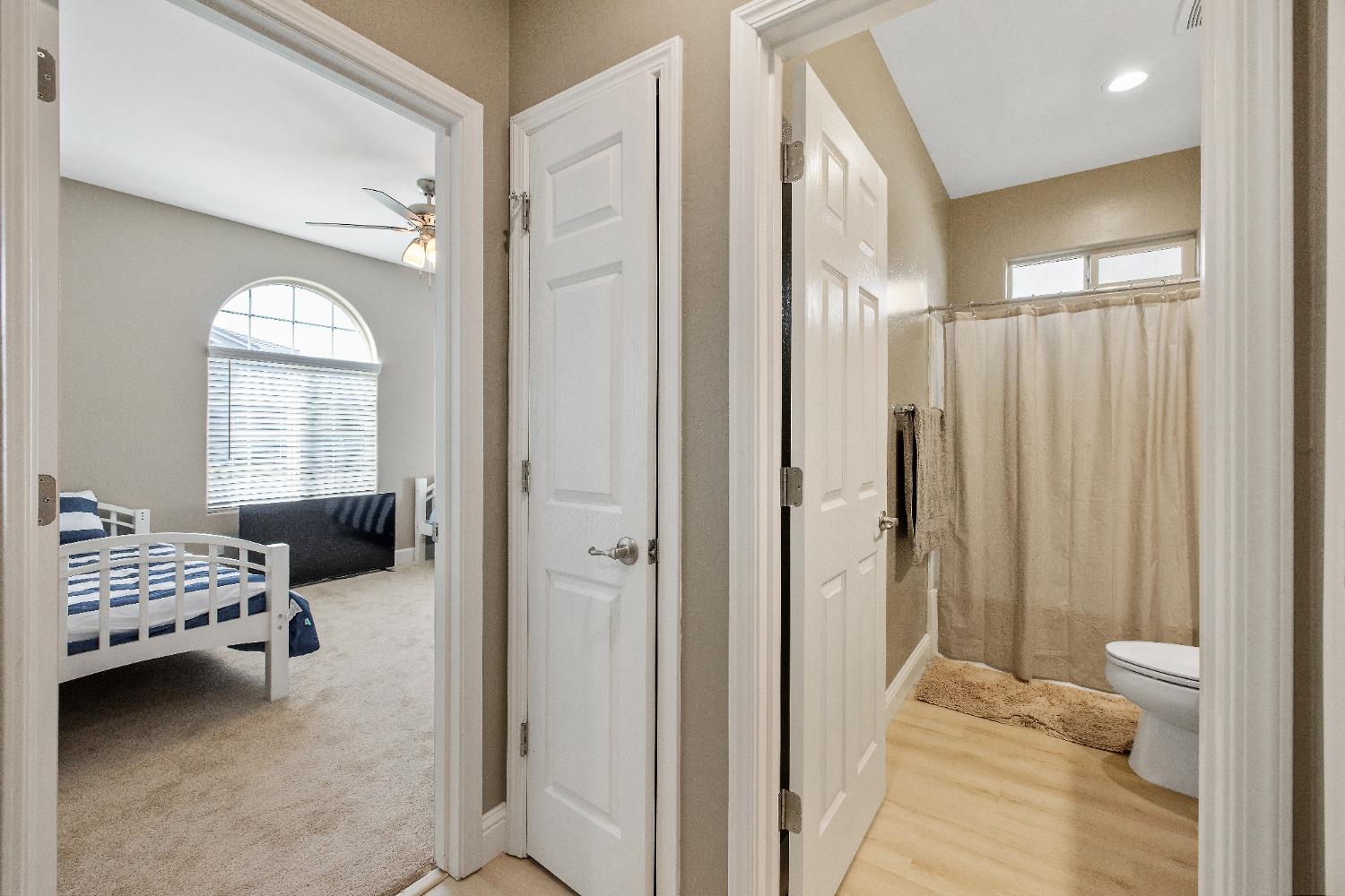 1210 Ridge Creek Estates Way Dinuba, CA 93618 - Photo 6 of 50 a bedroom with a bed and a window