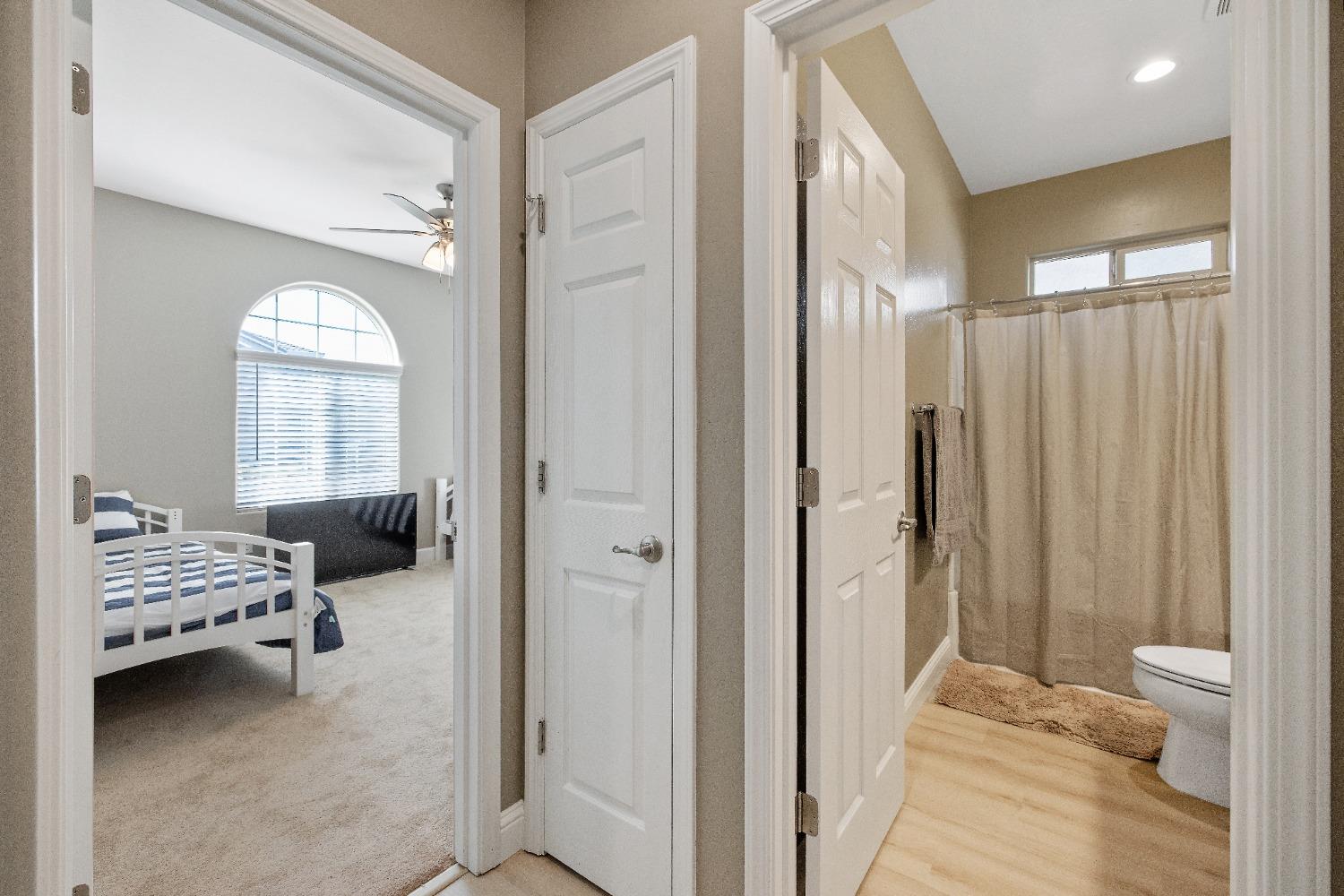 1210 Ridge Creek Estates Way Dinuba, CA 93618 - Photo 9 of 50 a bedroom with a bed and a window