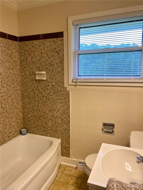 5458 Jesse Small Road Randleman, NC 27317 - Photo 28 of 30 Guest bath with custom tile shower surround