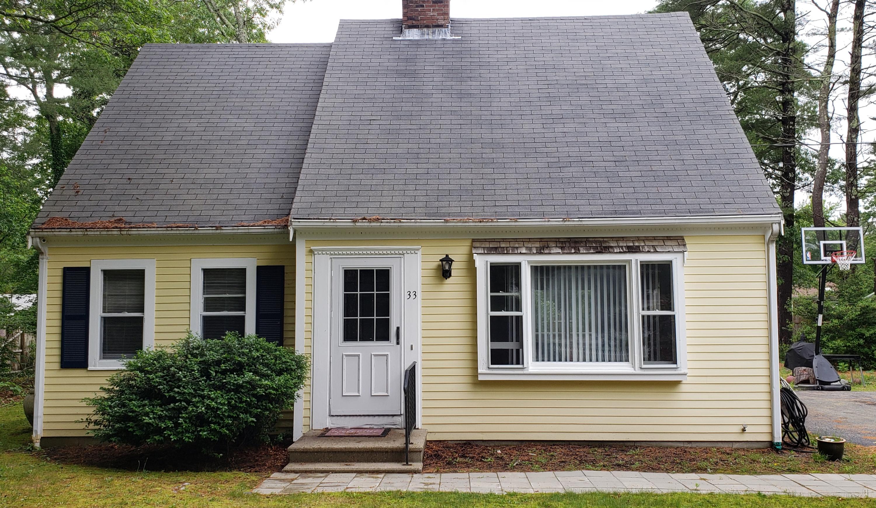 33 Goff Terrace Centerville, MA 02632 - Photo 1 of 22 a front view of a house with a yard