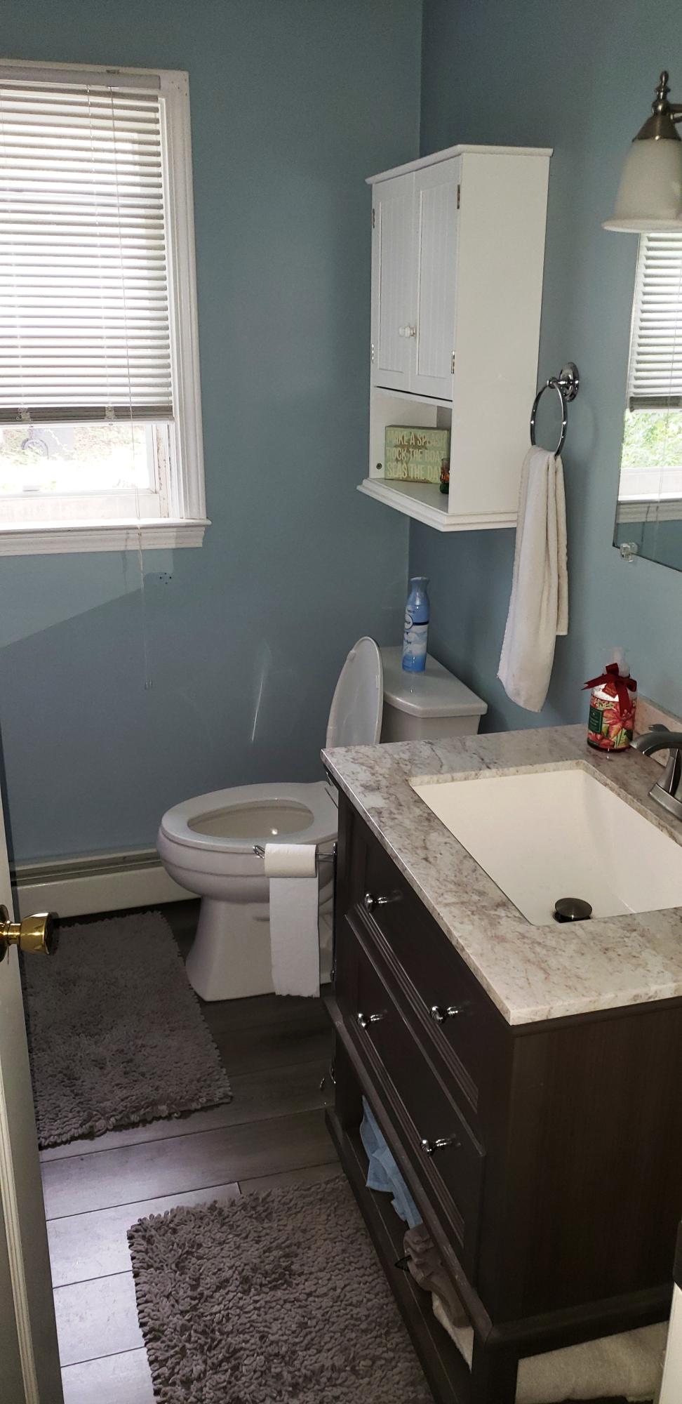 33 Goff Terrace Centerville, MA 02632 - Photo 13 of 22 a bathroom with a sink toilet and mirror