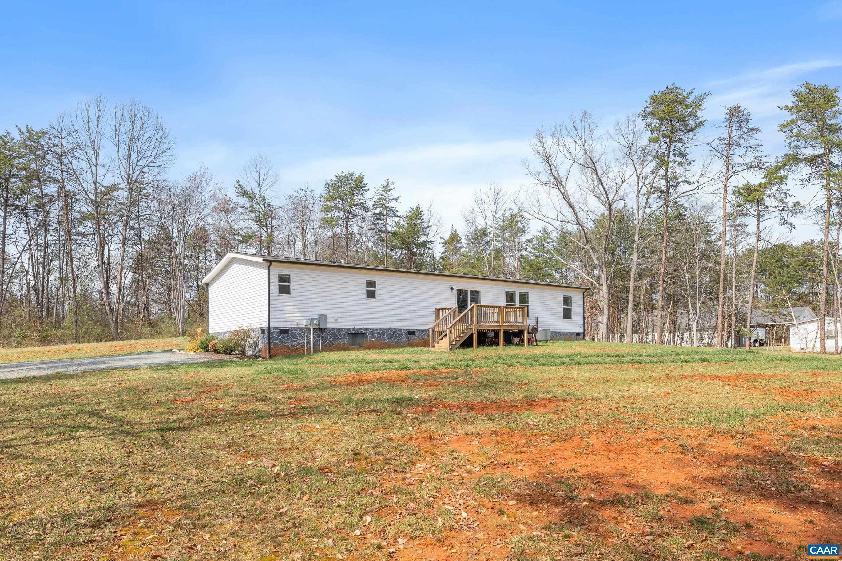 235 Shores Road Palmyra, VA 22963 - Photo 9 of 38 a house view with a outdoor space