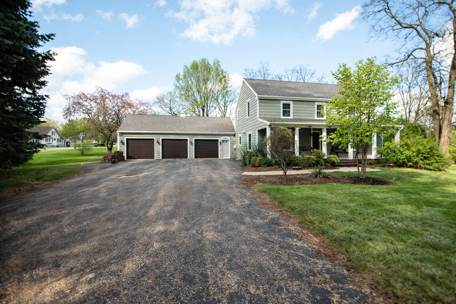 3868 Ogle Street Dixon, IL 61021 - Photo 2 of 49 a front view of house with yard and green space