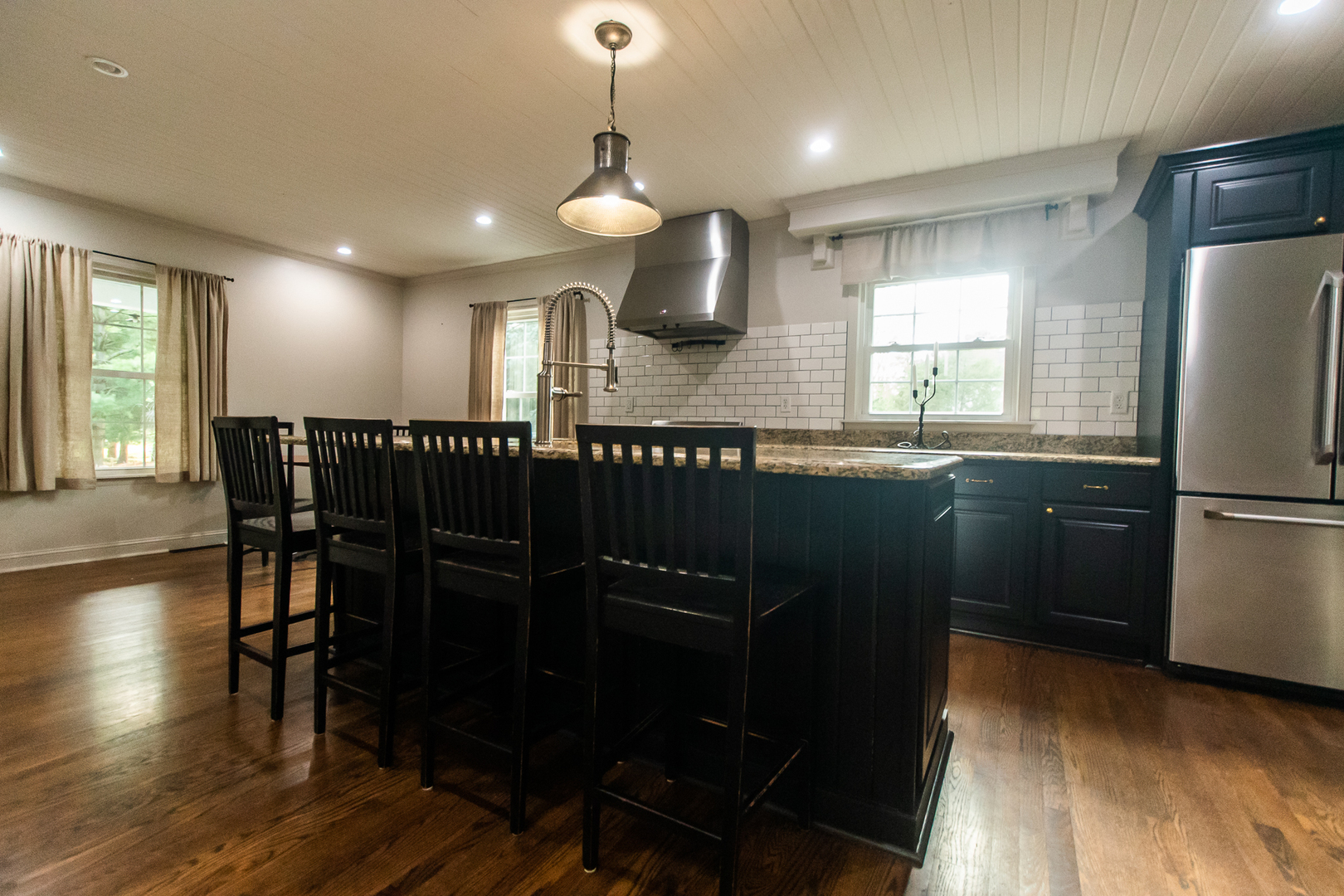 3868 Ogle Street Dixon, IL 61021 - Photo 24 of 49 a kitchen with stainless steel appliances granite countertop a sink a stove a refrigerator and island