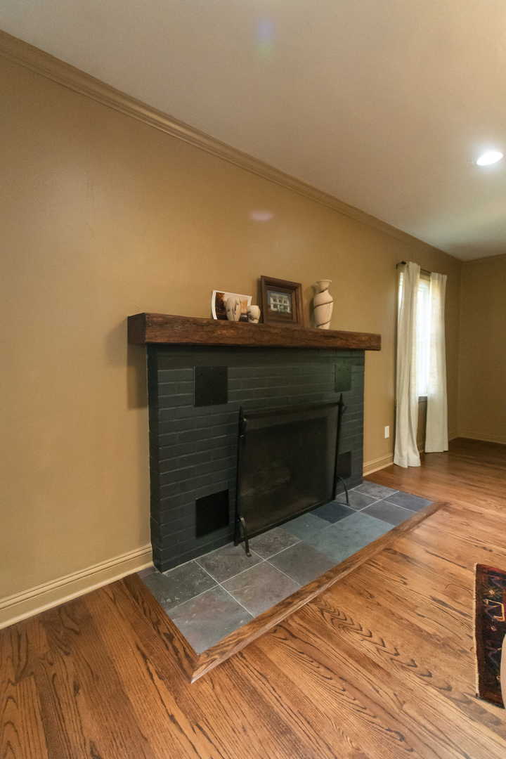 3868 Ogle Street Dixon, IL 61021 - Photo 27 of 49 a living room with a fireplace