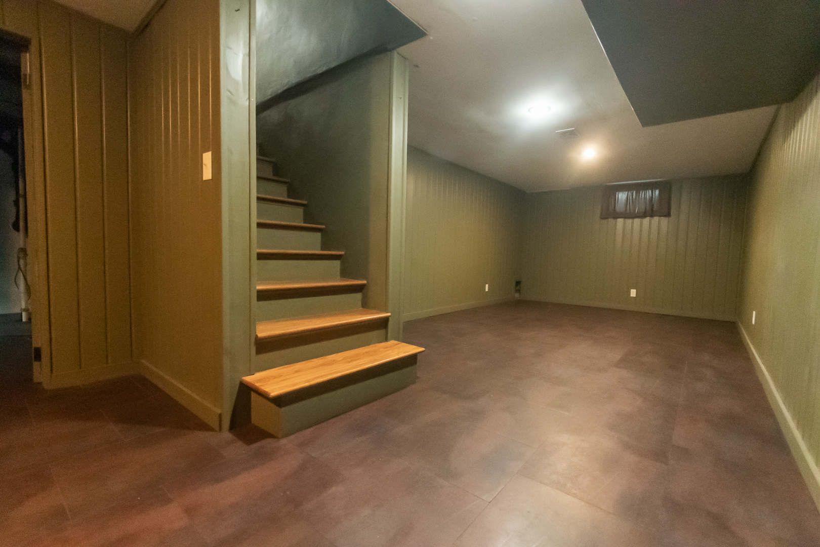 3868 Ogle Street Dixon, IL 61021 - Photo 31 of 49 an empty room with stairs and wooden door