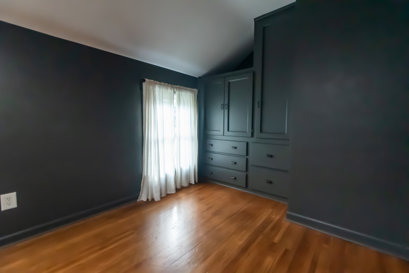 3868 Ogle Street Dixon, IL 61021 - Photo 41 of 49 an empty room with wooden floor and closet