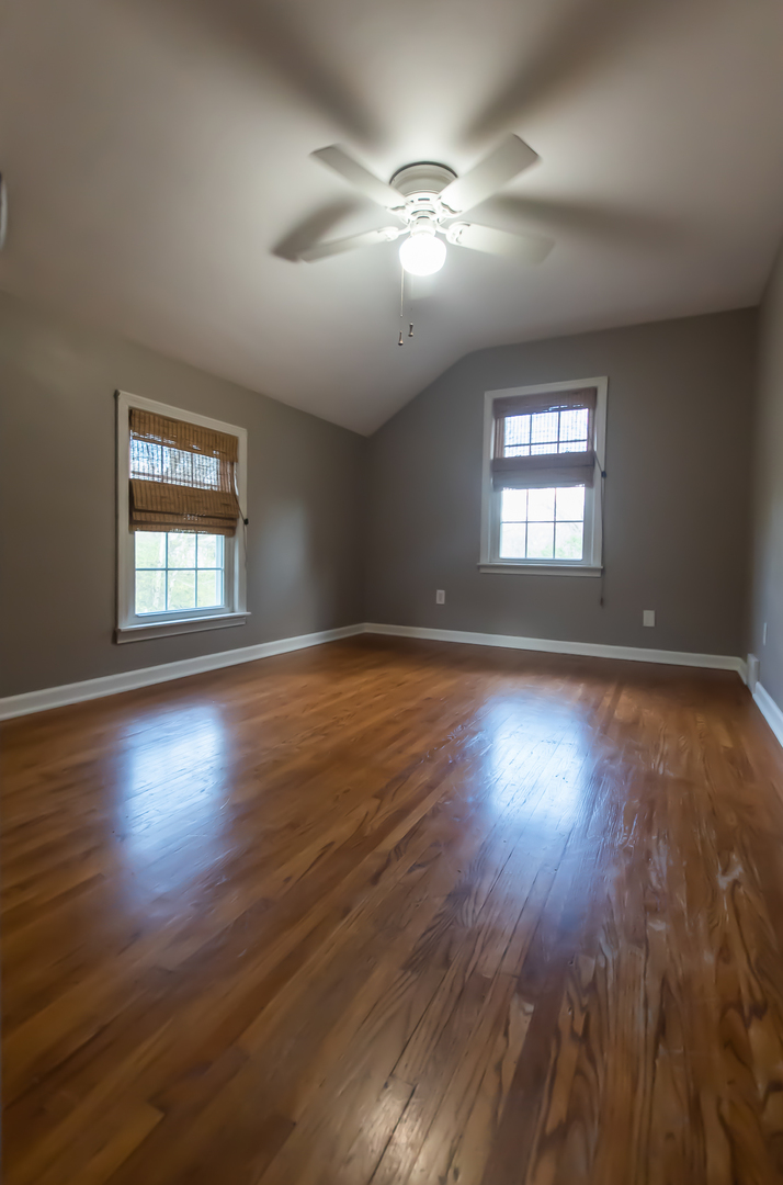 3868 Ogle Street Dixon, IL 61021 - Photo 45 of 49 a view of an empty room with wooden floor and a window