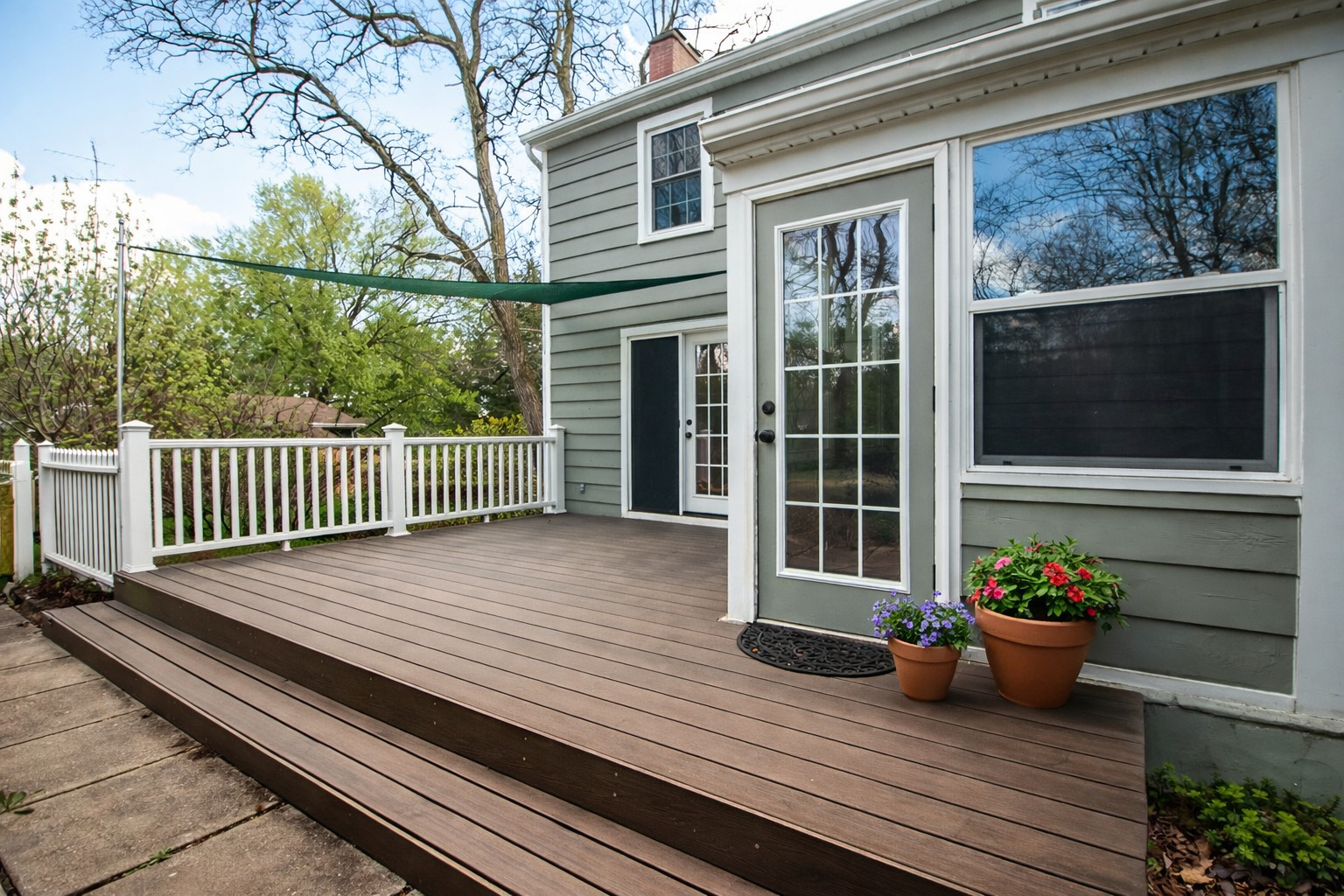 3868 Ogle Street Dixon, IL 61021 - Photo 7 of 49 a view of a wooden deck with a bench