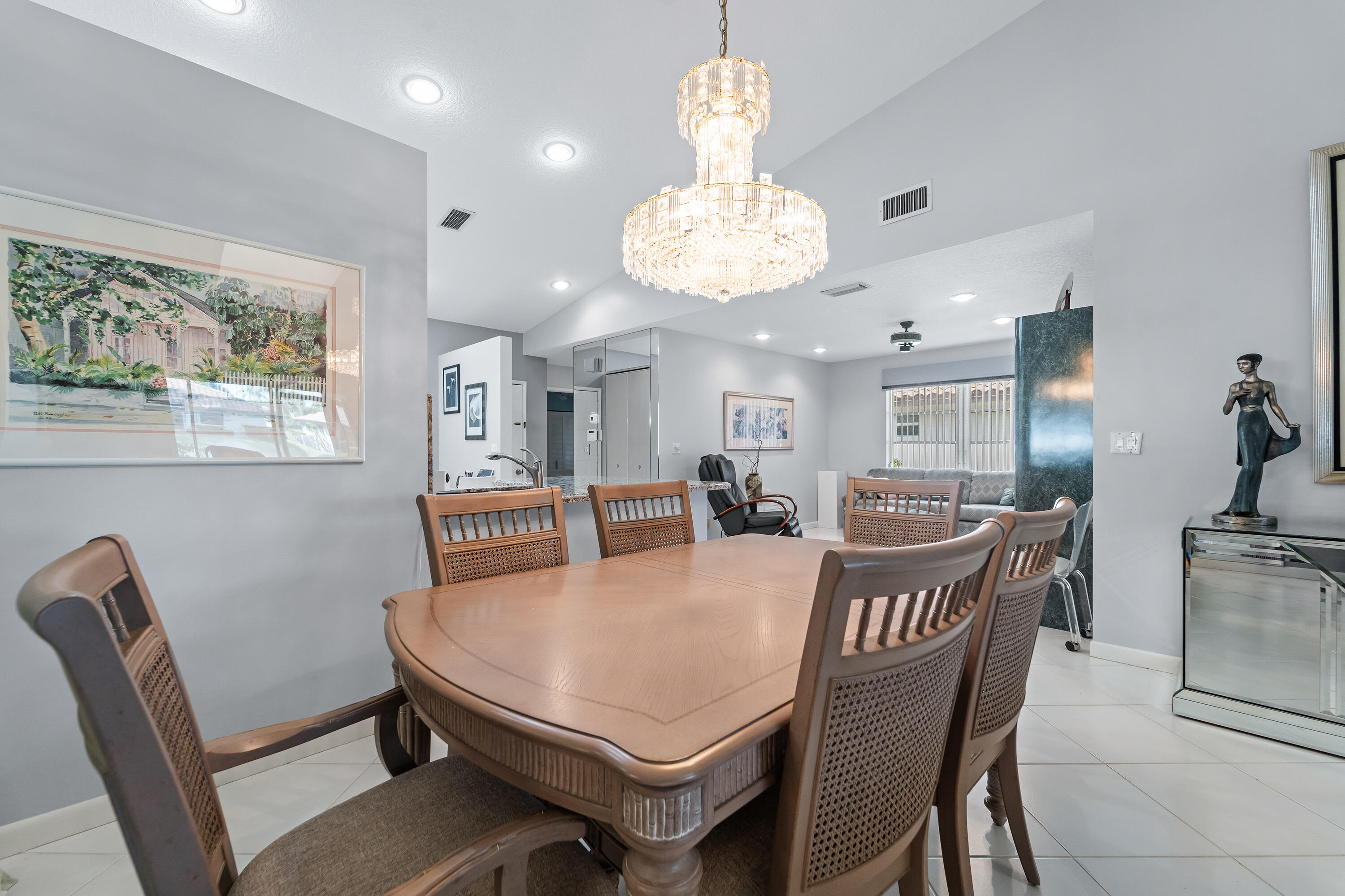 6339 Mill Pointe Circle Delray Beach, FL 33484 - Photo 32 of 61 a view of a dining room with furniture window and wooden floor