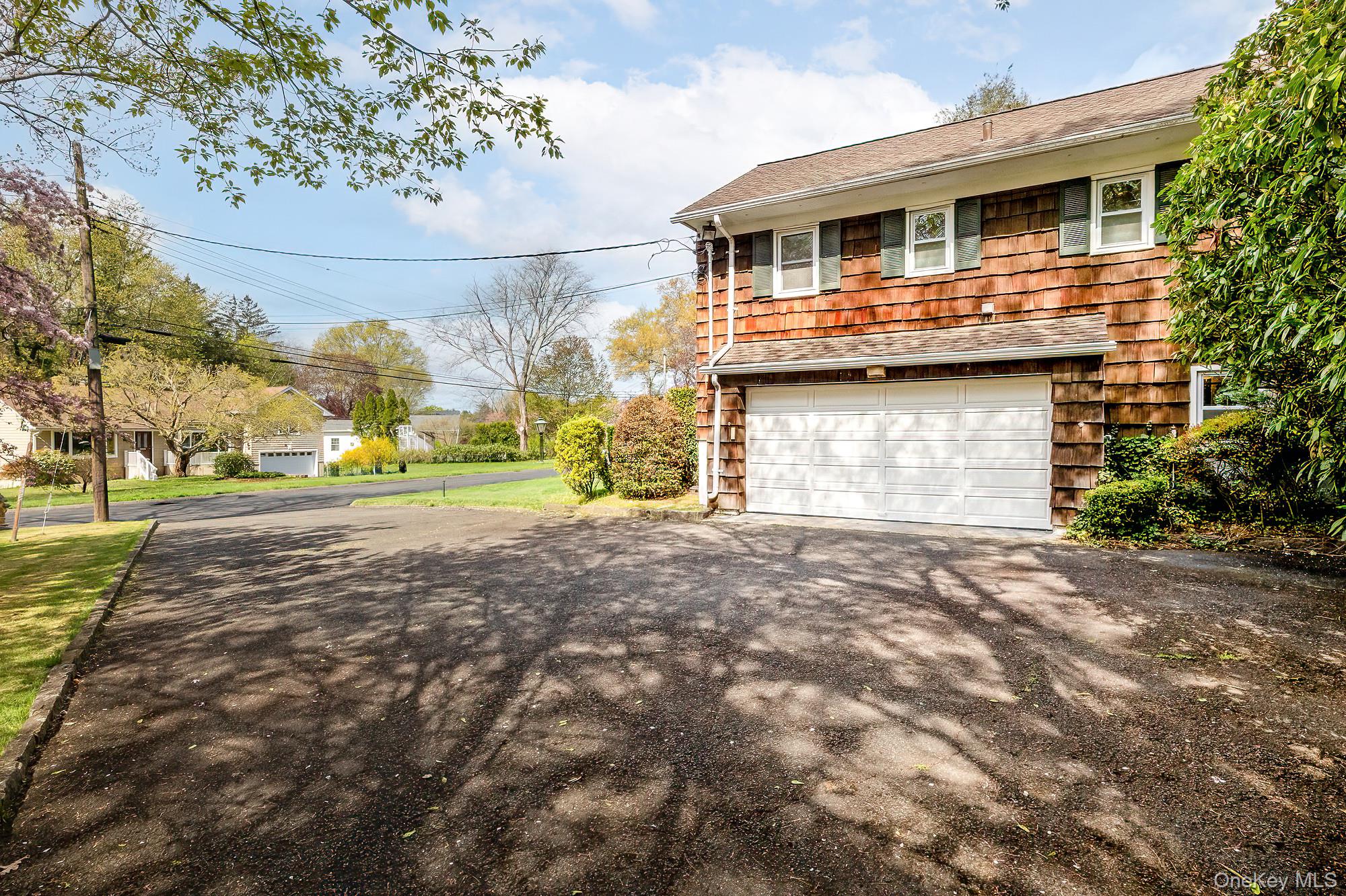 7 Carlton Lane Rye Brook, NY 10573 - Photo 37 of 44 Driveway with Garage
