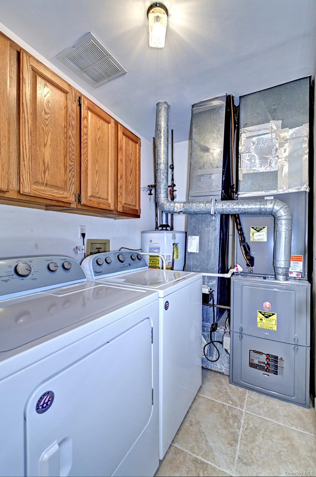 10 Oakdale Court Ridge, NY 11961 - Photo 21 of 41 a bathroom with a sink and a mirror