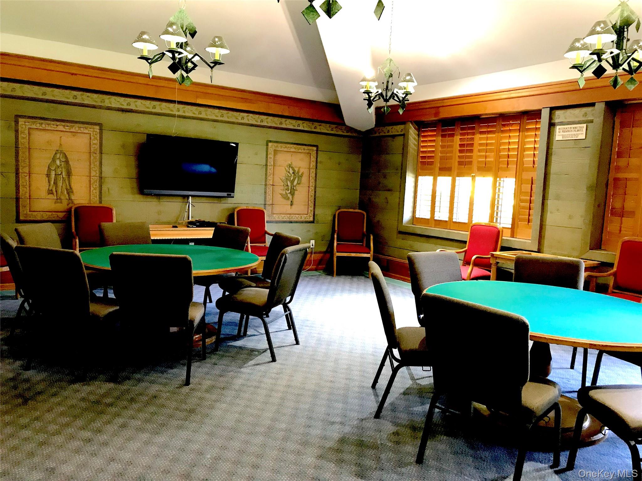 10 Oakdale Court Ridge, NY 11961 - Photo 31 of 41 a view of a dining room with furniture window and outside view