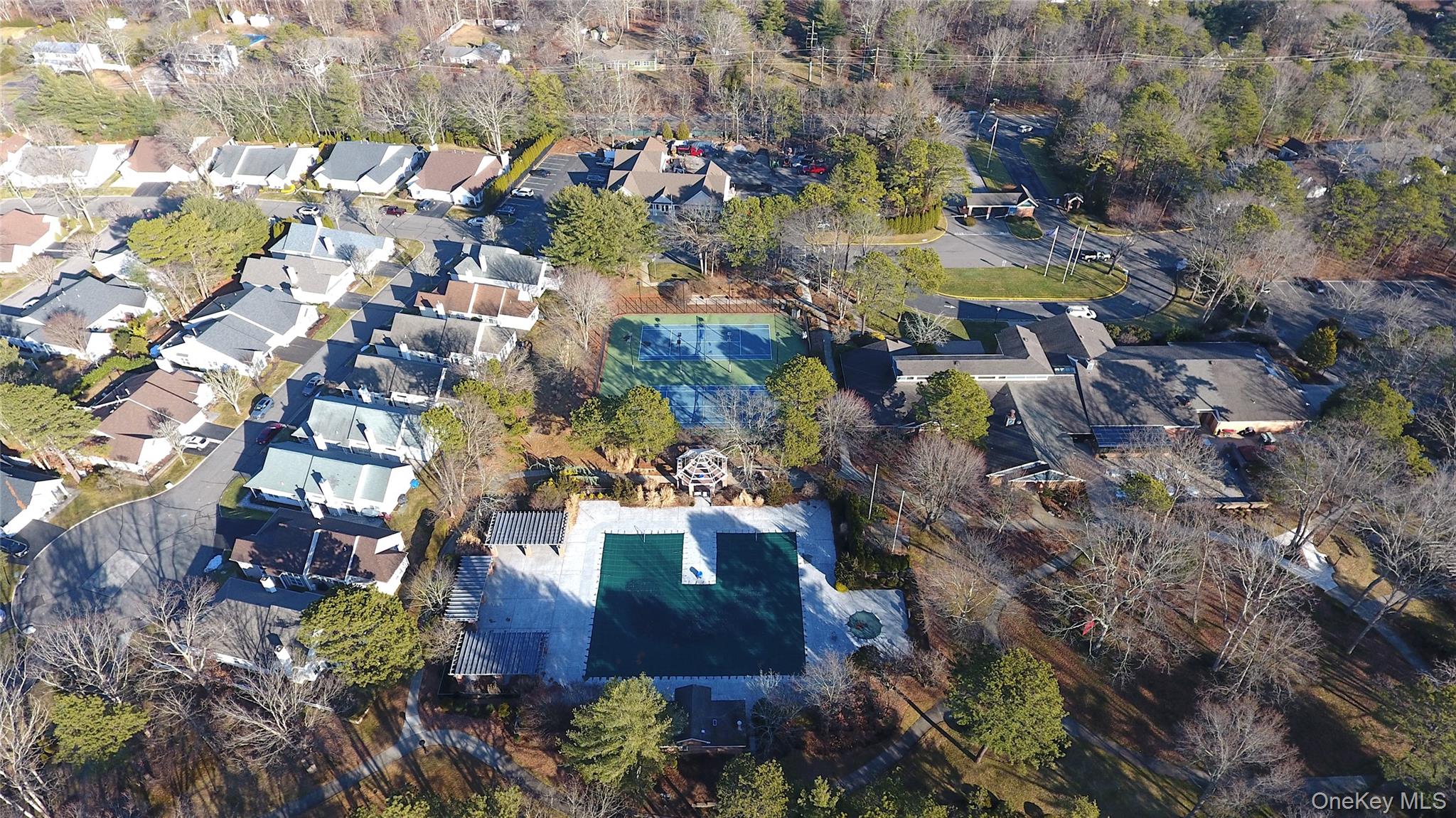 10 Oakdale Court Ridge, NY 11961 - Photo 39 of 41 an aerial view of residential house with outdoor space and swimming pool