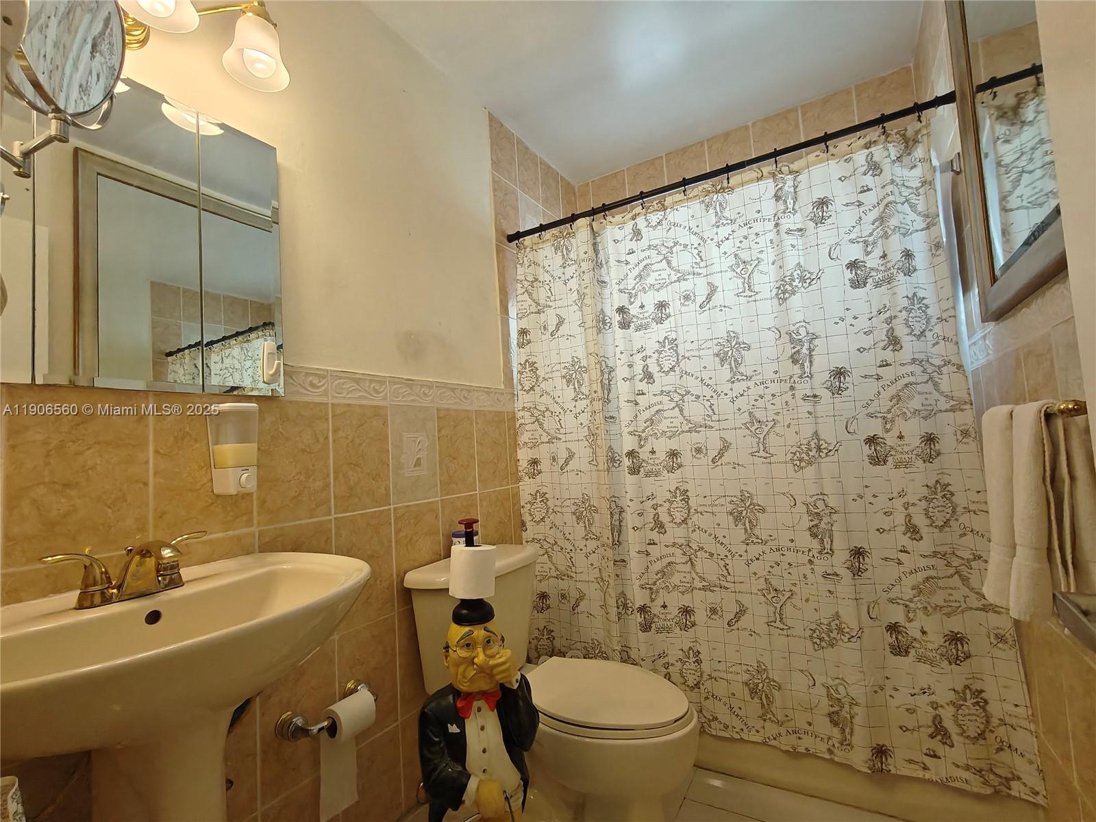 14444 Southwest 107th Terrace Miami, FL 33186 - Photo 28 of 73 a bathroom with a sink and a mirror