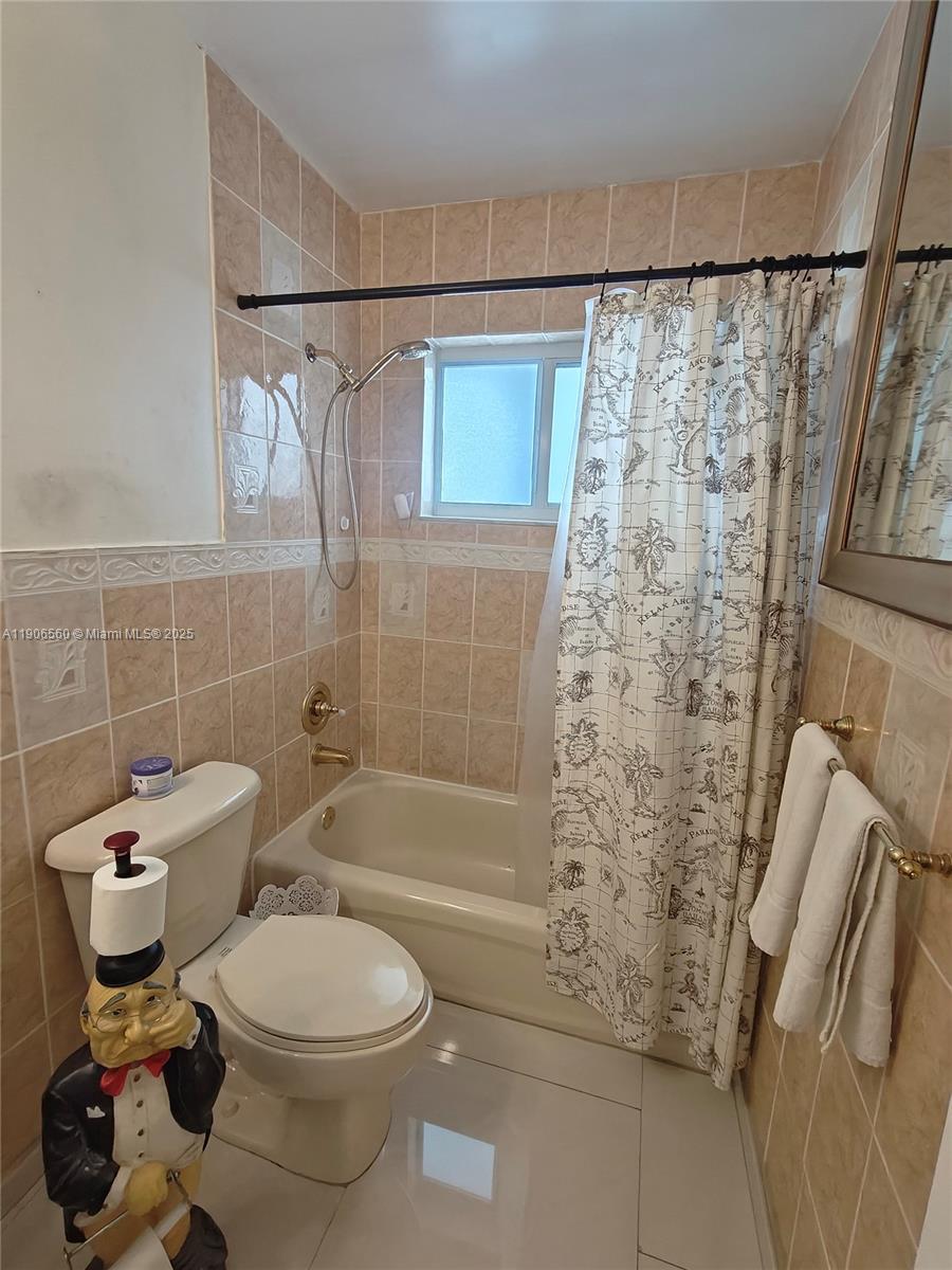 14444 Southwest 107th Terrace Miami, FL 33186 - Photo 30 of 73 a bathroom with a toilet and shower