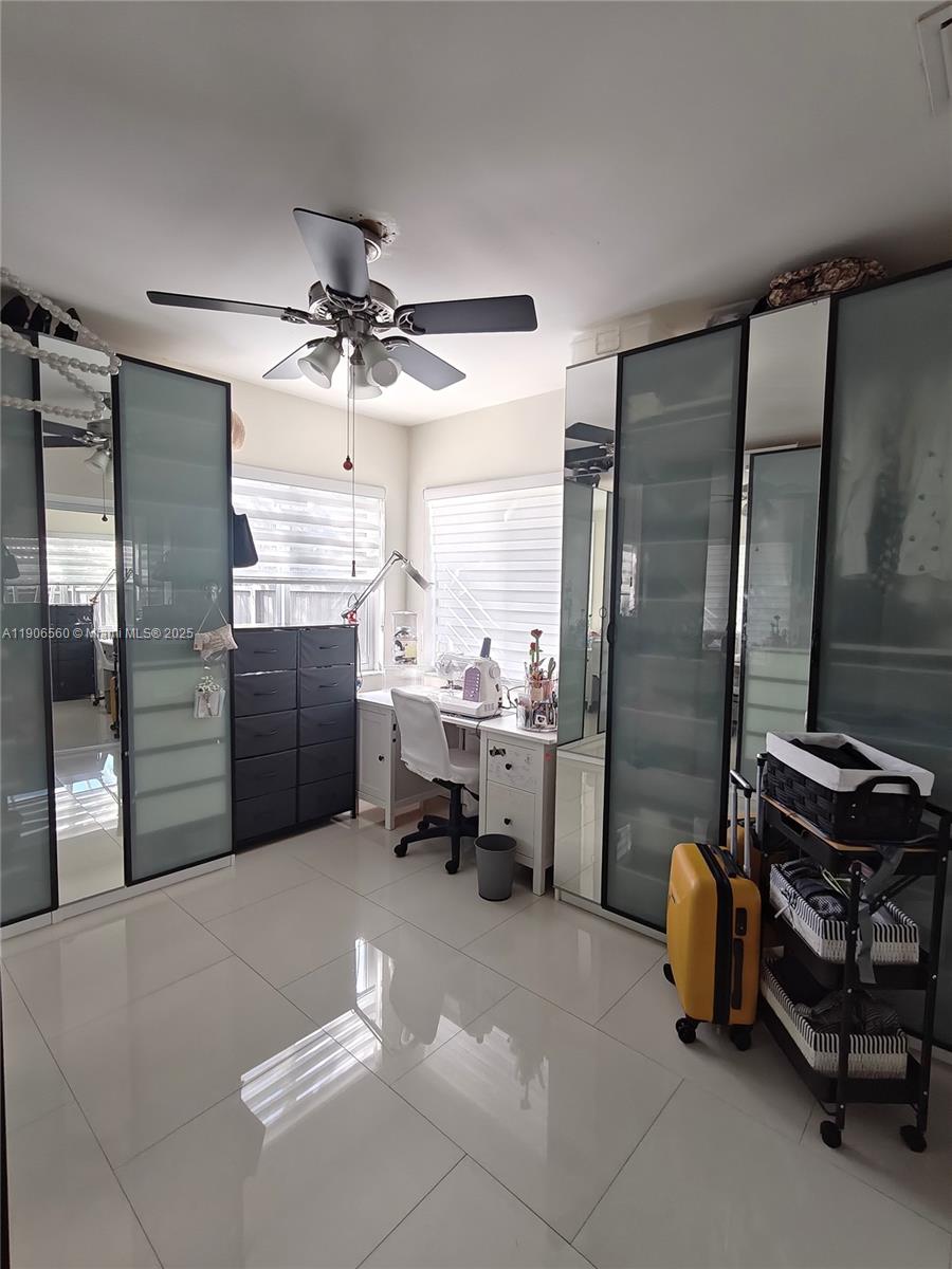 14444 Southwest 107th Terrace Miami, FL 33186 - Photo 33 of 73 a kitchen with refrigerator and window