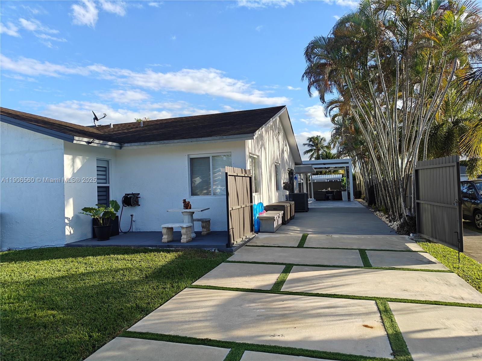14444 Southwest 107th Terrace Miami, FL 33186 - Photo 69 of 73 a view of outdoor space yard deck and house
