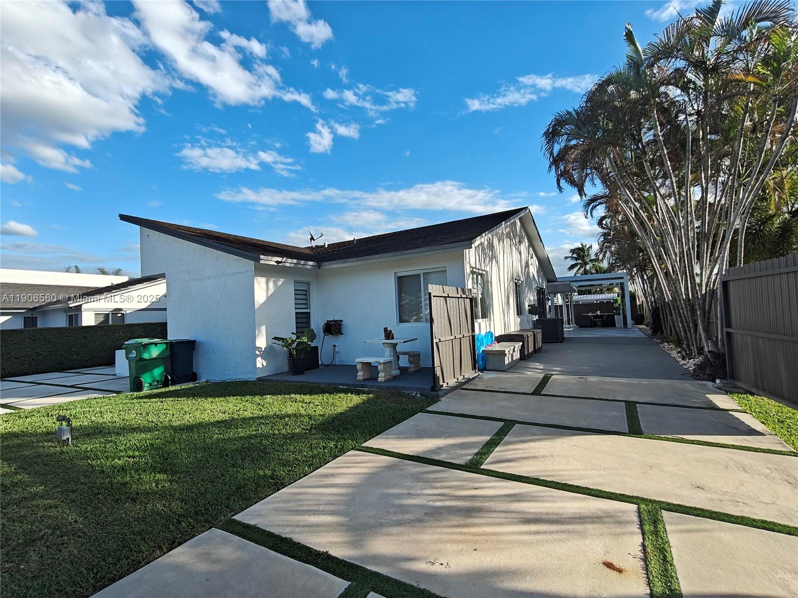 14444 Southwest 107th Terrace Miami, FL 33186 - Photo 71 of 73 a view of a house with a patio