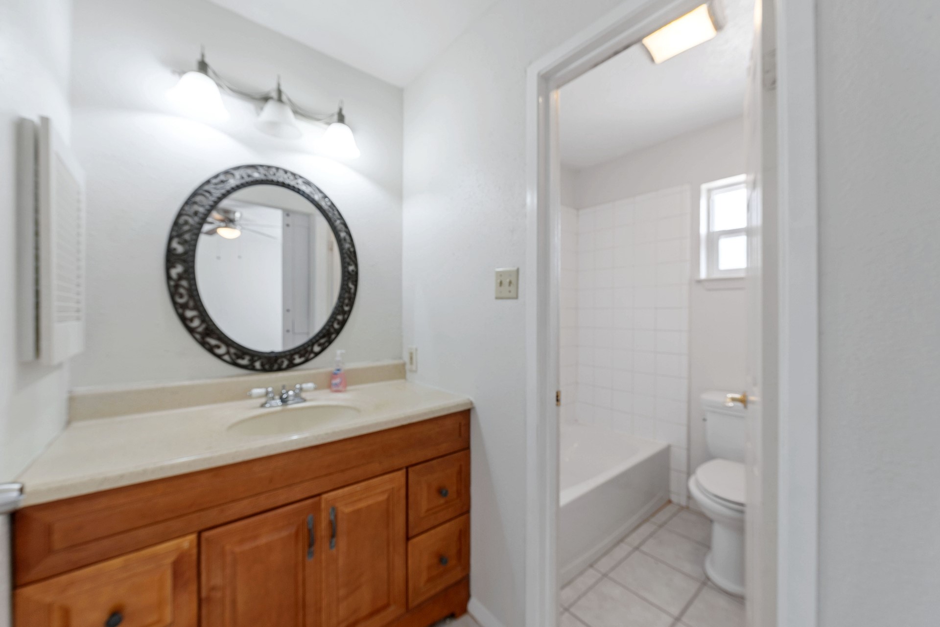 9622 Birsay Street Spring, TX 77379 - Photo 11 of 17 Primary bathroom offers privacy with separate vanity area.