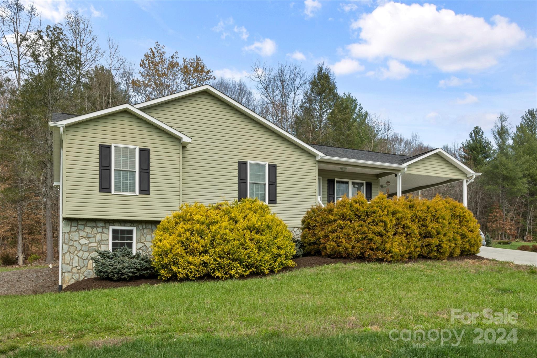 3624 Deerbrook Road Lenoir, NC 28645 - Photo 1 of 28 a front view of house with yard and green space