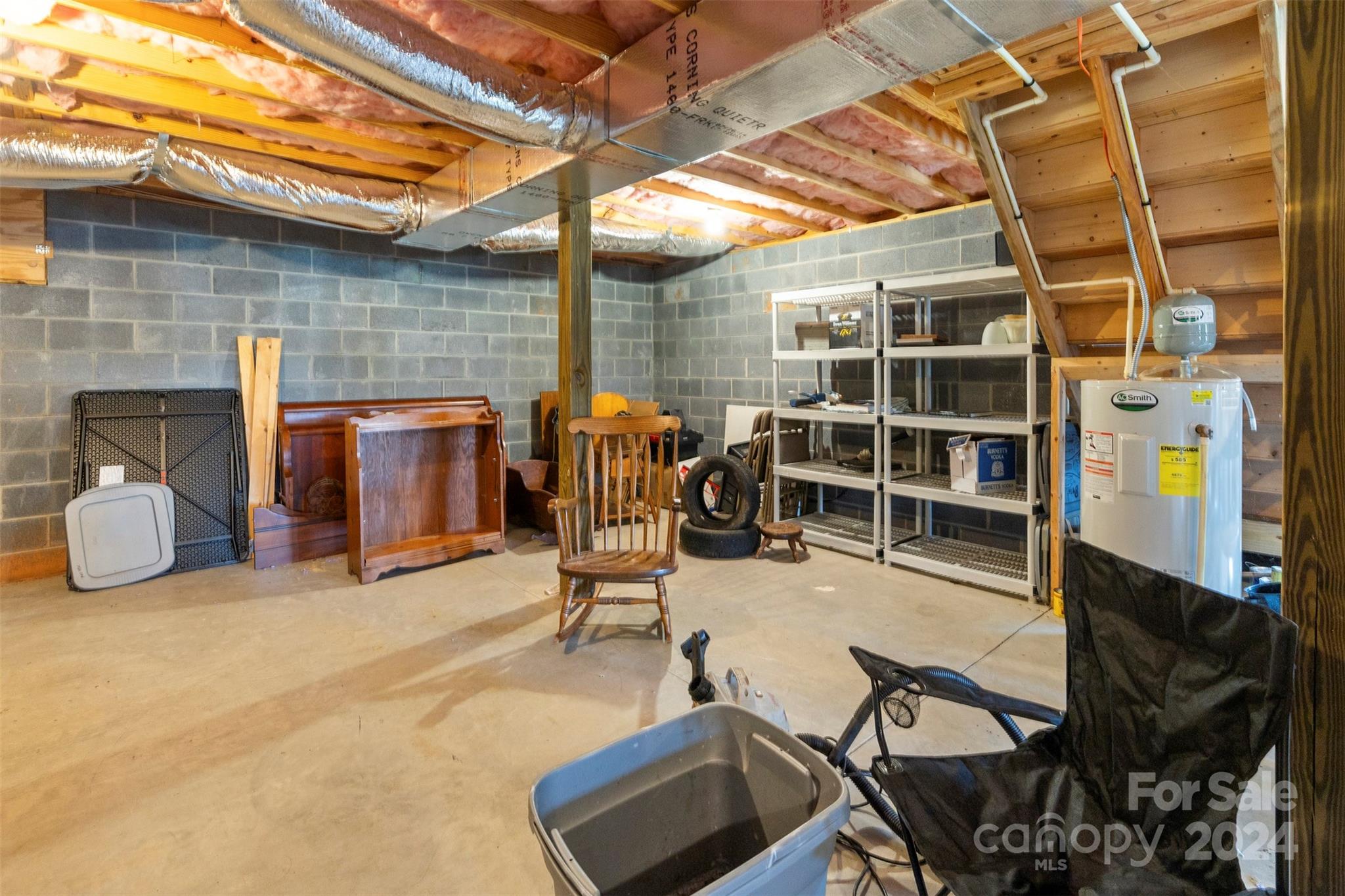 3624 Deerbrook Road Lenoir, NC 28645 - Photo 26 of 28 a view of living room with wooden floor and seating space
