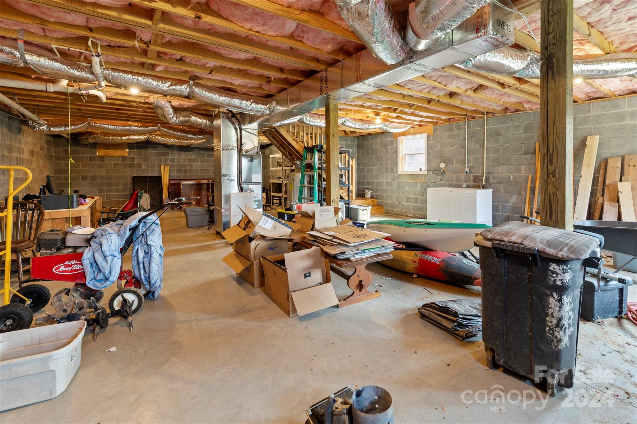 3624 Deerbrook Road Lenoir, NC 28645 - Photo 27 of 28 a view of a storage room with gym equipment