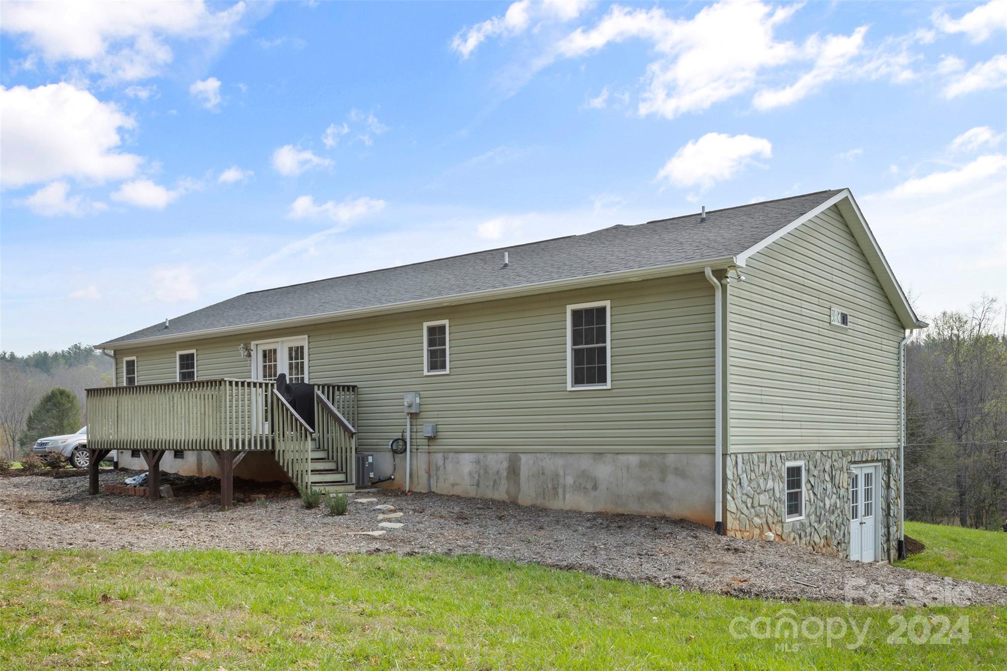 3624 Deerbrook Road Lenoir, NC 28645 - Photo 6 of 28 a view of a house with backyard