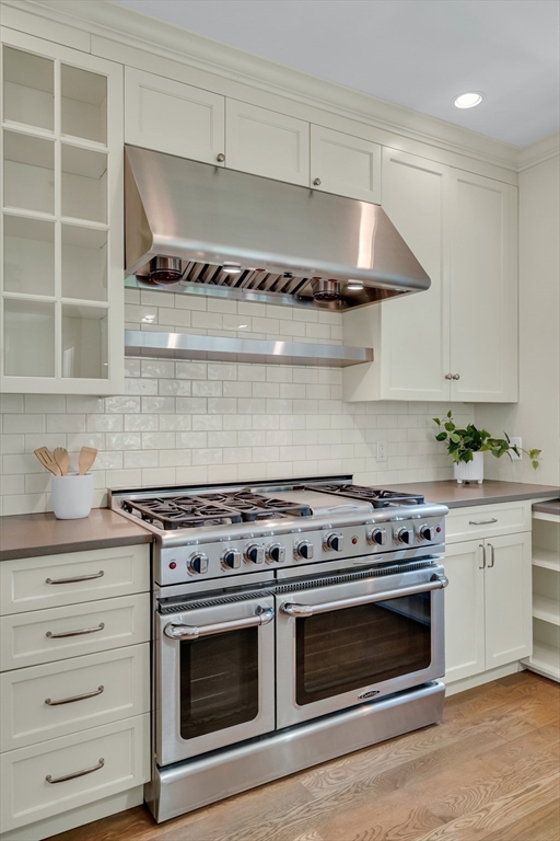 2 Percy Place Cambridge, MA 02139 - Photo 12 of 37 a stove top oven sitting inside of a kitchen