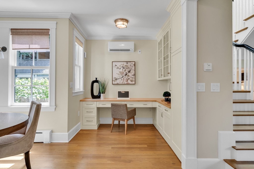 2 Percy Place Cambridge, MA 02139 - Photo 16 of 37 a view of a workspace with furniture and a window