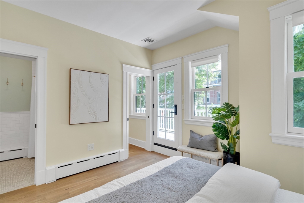2 Percy Place Cambridge, MA 02139 - Photo 18 of 37 a living room with furniture and a potted plant