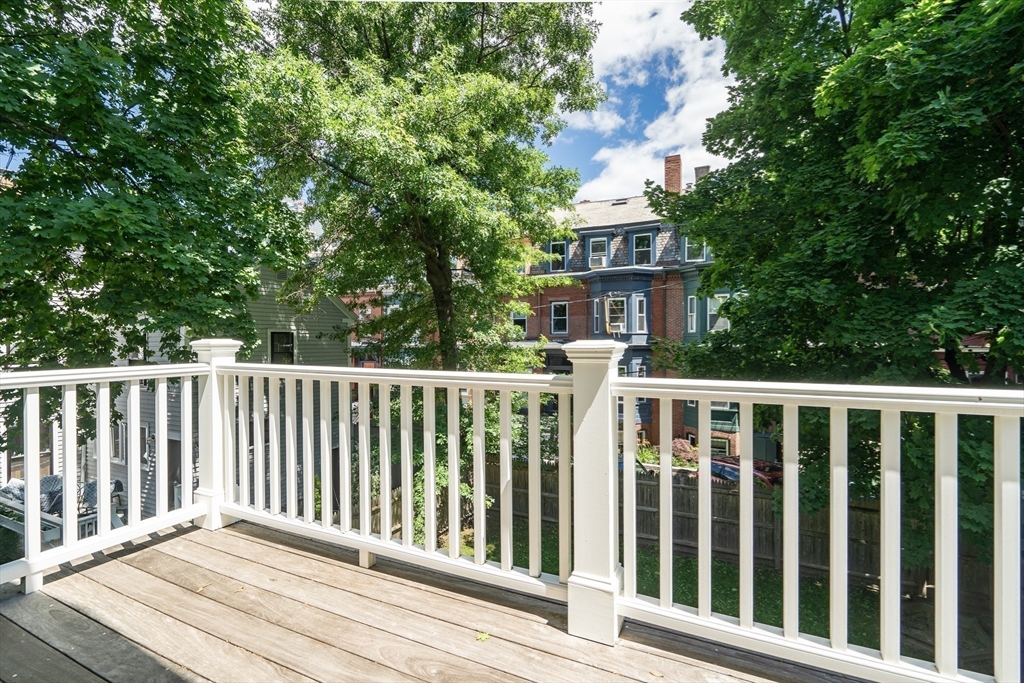 2 Percy Place Cambridge, MA 02139 - Photo 19 of 37 a balcony with wooden floor and fence