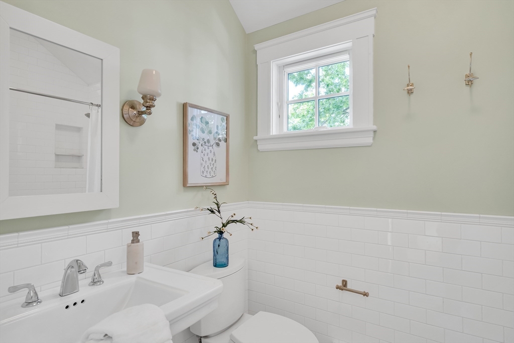 2 Percy Place Cambridge, MA 02139 - Photo 21 of 37 a bathroom with a sink mirror and toilet