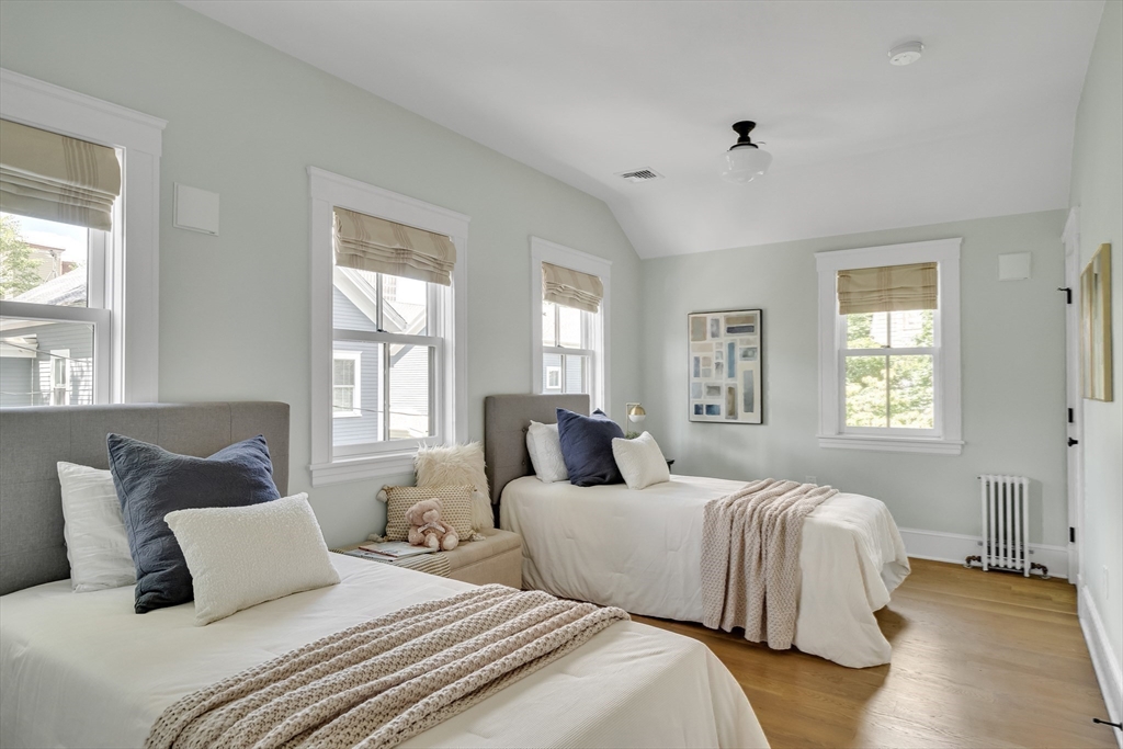 2 Percy Place Cambridge, MA 02139 - Photo 23 of 37 a bedroom with two beds and a large window