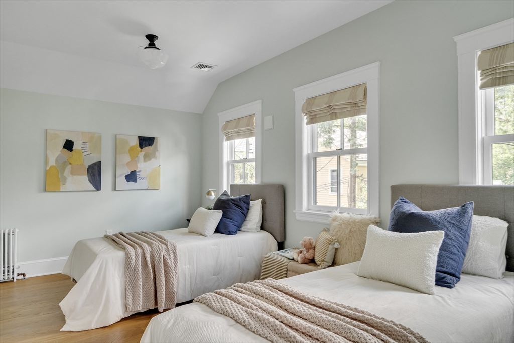 2 Percy Place Cambridge, MA 02139 - Photo 24 of 37 a bedroom with two beds and a window
