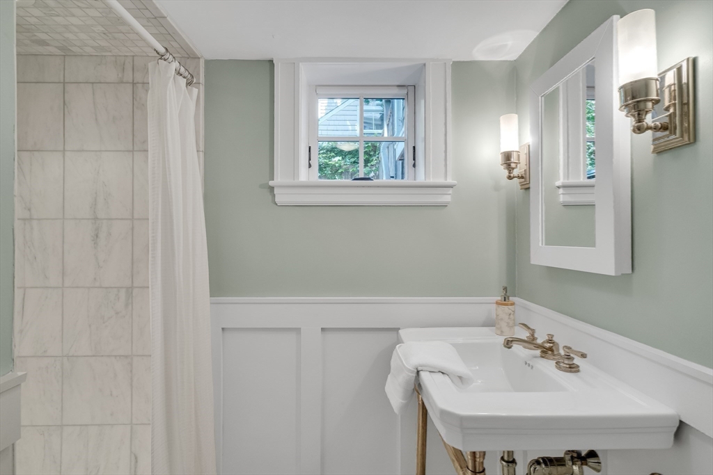2 Percy Place Cambridge, MA 02139 - Photo 29 of 37 a bathroom with a sink and a window