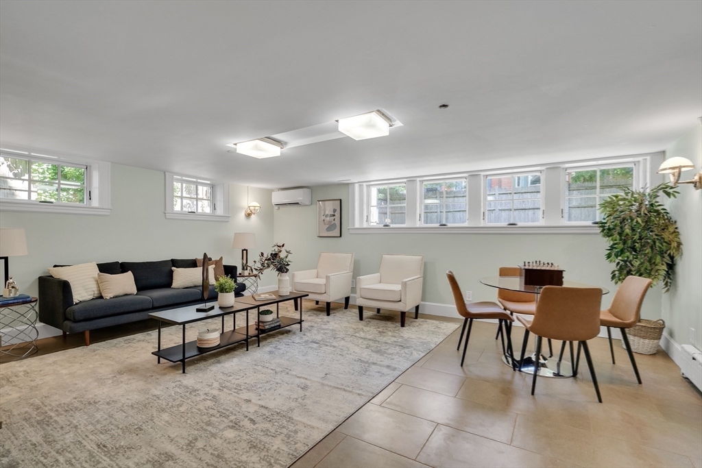 2 Percy Place Cambridge, MA 02139 - Photo 30 of 37 a living room with furniture and wooden floor