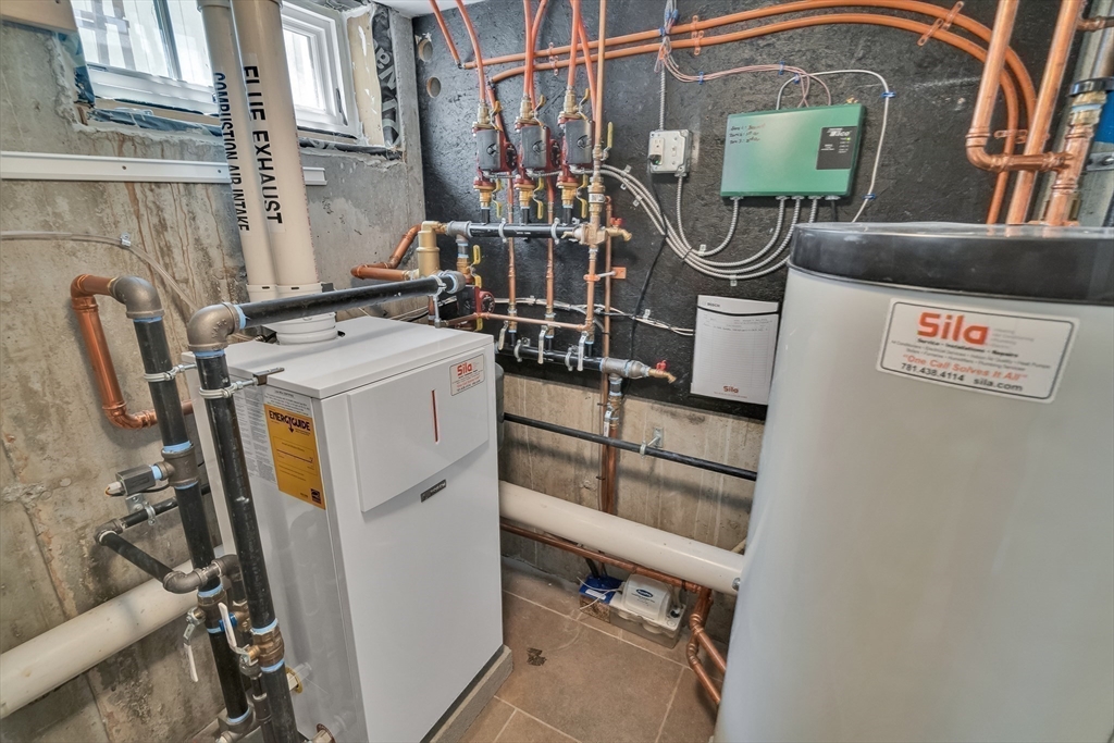 2 Percy Place Cambridge, MA 02139 - Photo 32 of 37 a utility room with dryer and washer