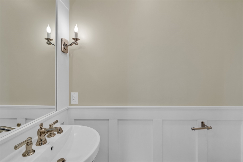 2 Percy Place Cambridge, MA 02139 - Photo 4 of 37 a bathroom with a sink and a mirror